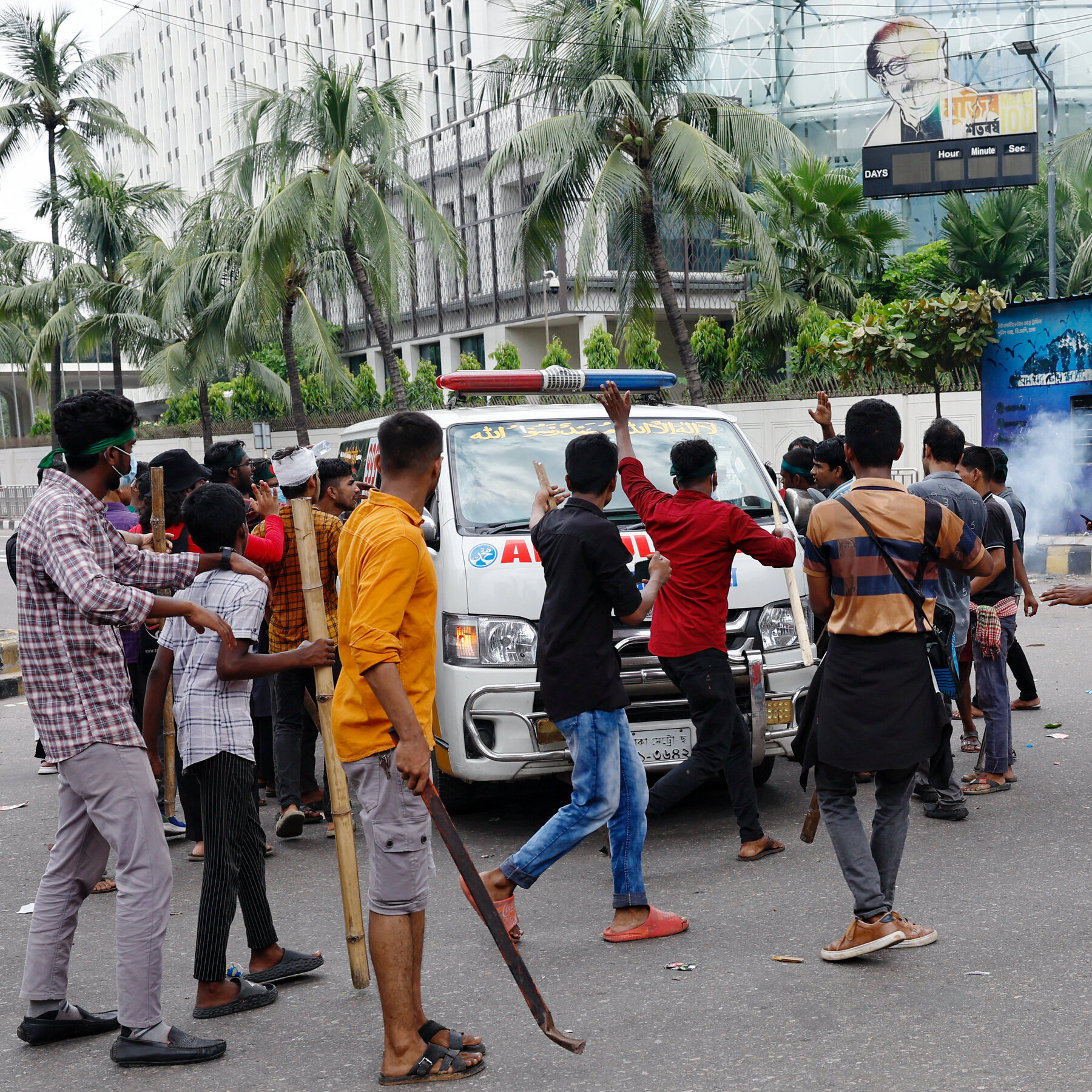 Bangladesh Back Under Curfew After Protests Leave Dozens Dead